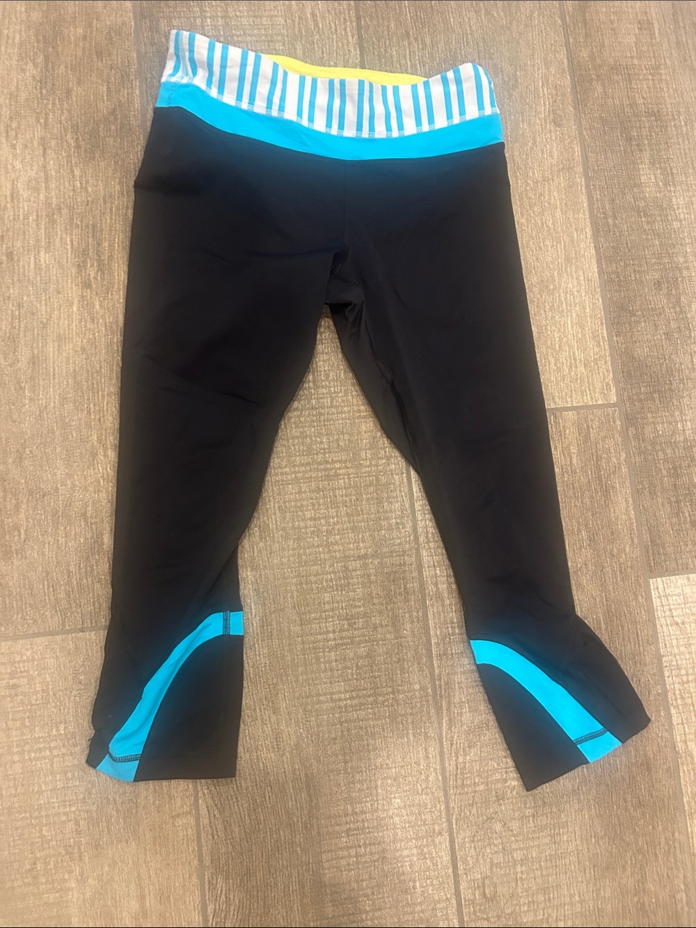lululemon athletica Black Cropped Leggings with Blue Trim and Striped Waistband